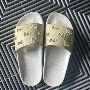 Gucci Gold and White Sandals with Embossed Design